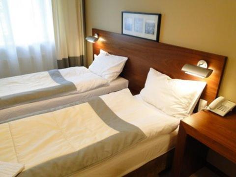Hotel Atrium Elblag Quarto foto